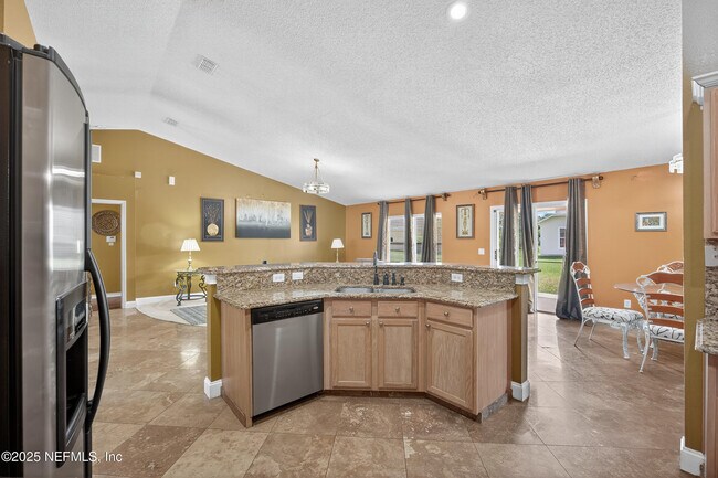 Building Photo - 10375 Woodley Creek Blvd
