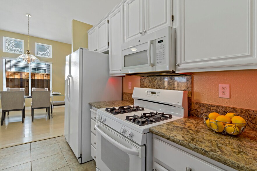 Kitchen with microwave and stove - 278 Havenwood Cir