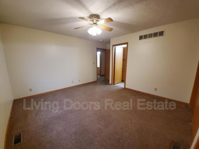 Building Photo - 6441 Whitewater Ln