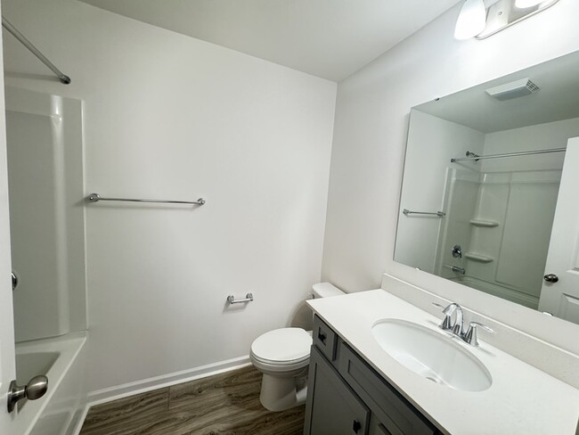 Building Photo - Two bedroom 2 1/2 bath townhome covered fr...