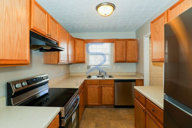 Building Photo - Move in before January 31st and choose your reward: a $250 Amazon Gift Card or a 55" Smart TV!