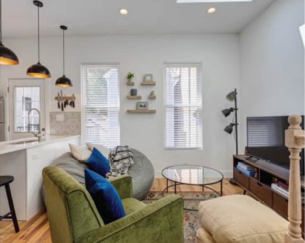 Open concept living room to kitchen with skylights - 1401 N Mohawk St