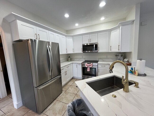 Building Photo - Beautiful Mediterranean Pool Home Availabl...