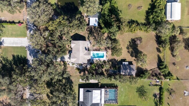 Building Photo - Country-Style Sarasota Living on a Full Acre - Pool Home with Oversized Workshop — Move-In Ready Now