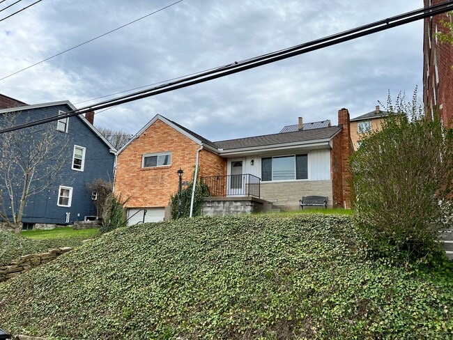 Building Photo - Fantastically updated three bedroom two bath house in the heart of Dormont