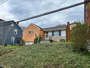 Building Photo - Fantastically updated three bedroom two bath house in the heart of Dormont