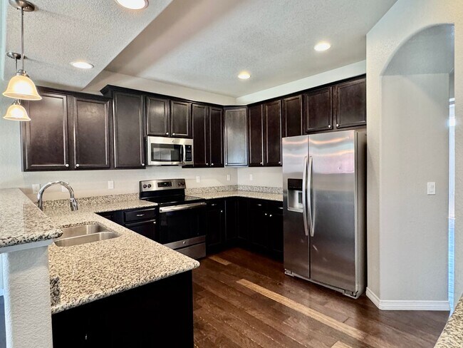 Building Photo - Beautifully Maintained Woodmoor Home Featu...