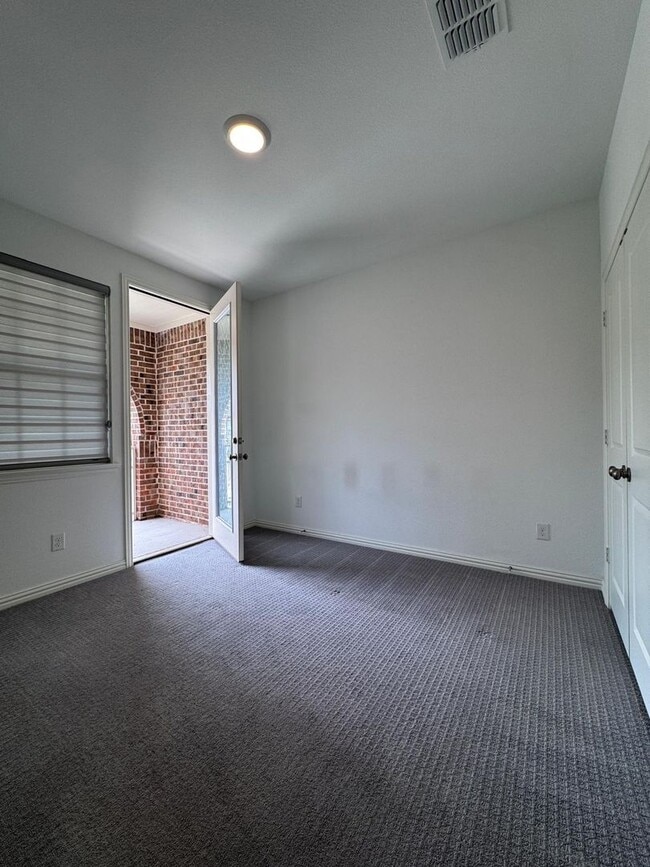 Building Photo - FULLY UPGRADED LUXURY TOWNHOME located in ...