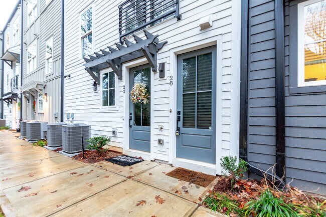 Primary Photo - Modern Living Meets Walkable City Charm in...