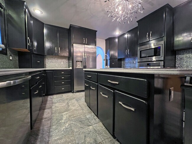 Building Photo - Stunning 4 Bedroom 2.5 Bath with Peek-a-Boo View of Puget Sound