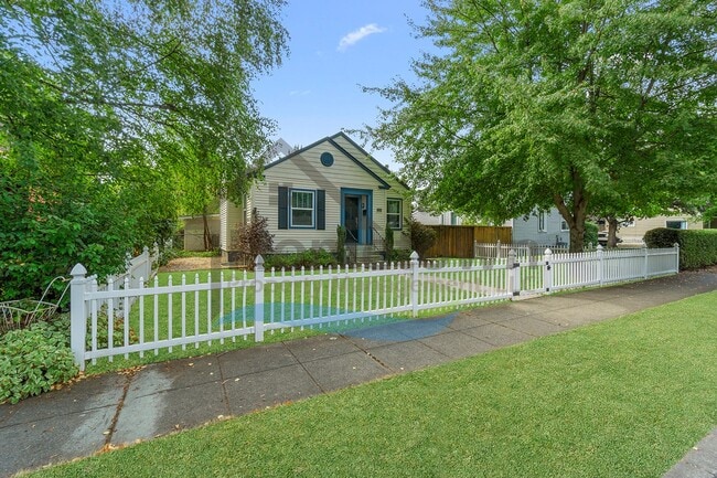 Primary Photo - 4 Bedroom 2 Bathroom Home with a Fully Fen...