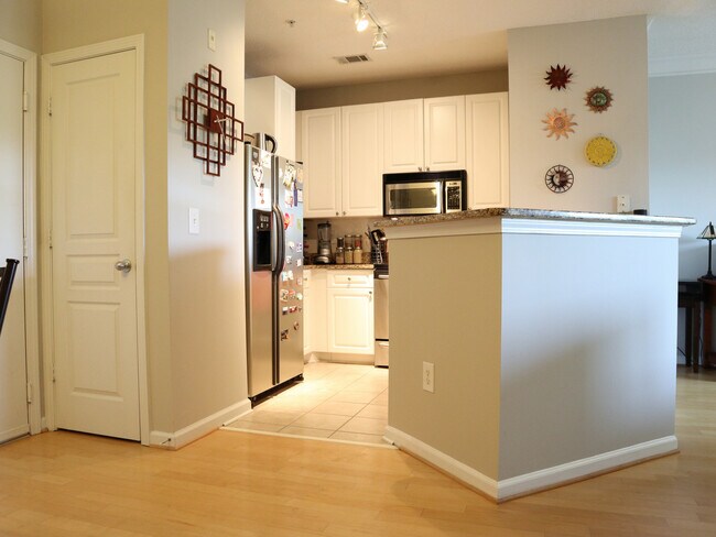 View of kitchen and front closet from kitchen table - 10 Perimeter Summit Blvd NE
