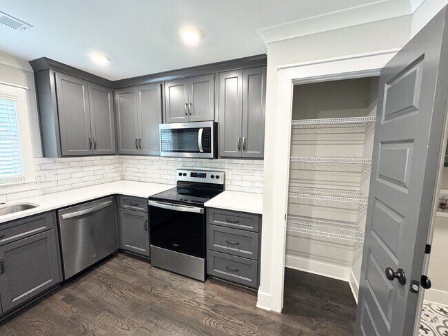 Building Photo - Walk to Downtown Ball Ground—Charming 1 Be...