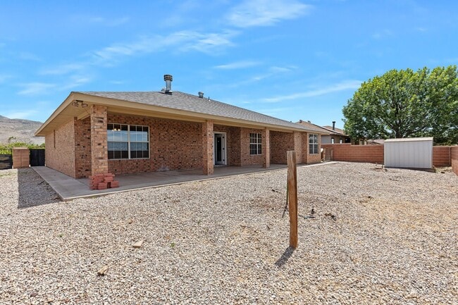 Building Photo - 4 Bedroom 2 Bath with Solar on a Large Corner Lot