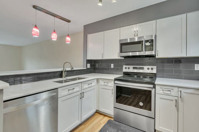 Building Photo - Two-Story Condo Near Delridge Library with Private Courtyard & Easy Downtown Access