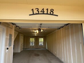 Building Photo - Large garage with attached spacious 2 bedroom townhome