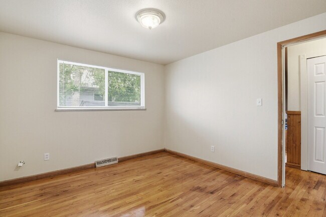 Building Photo - $2,495.95, 4 bed, 1.5 bath with a large backyard.