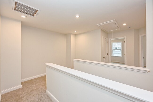 Building Photo - **BE THE LUCKY ONE TO LIVE IN THIS 2024-BUILT TOWNHOME**