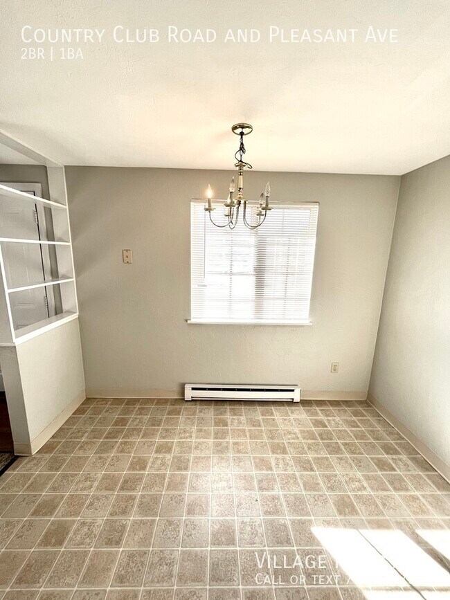 Building Photo - 605 Country Club Rd