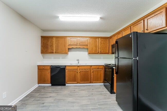 Building Photo - 719 Woodwind Dr