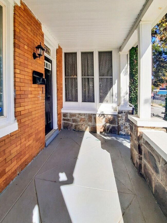 Building Photo - Modern 3BR Porch-Front TH in Allendale – S...