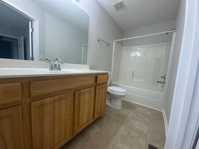 Building Photo - Newly Renovated 3BR 2BA home close to GM, Magna, Industrial Park