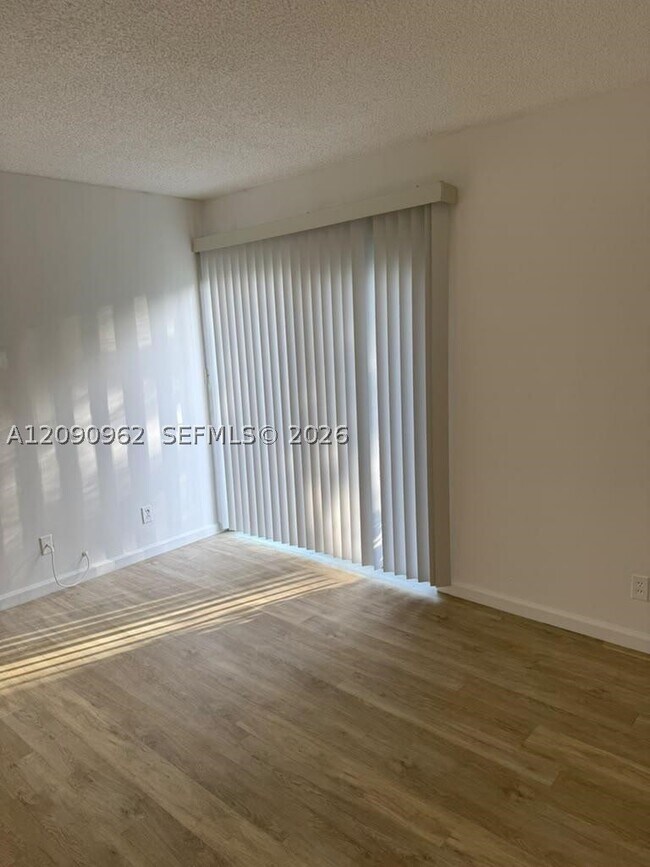Building Photo - 8740 N Sherman Cir