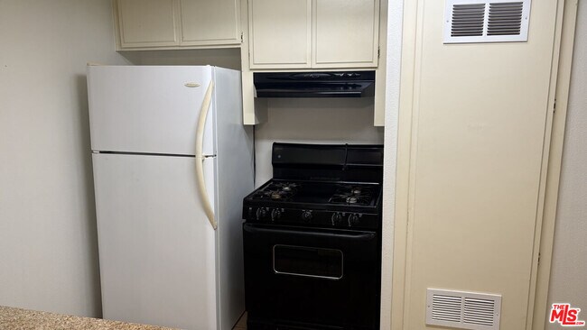 Building Photo - 15716 Normandie Ave