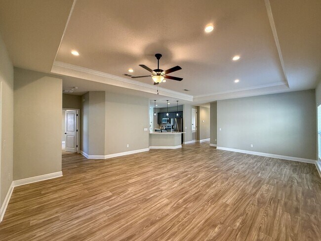 Building Photo - Spacious 3 Bedroom 2 Bath + Office with Split Floor Plan & Screened Patio in Pace!
