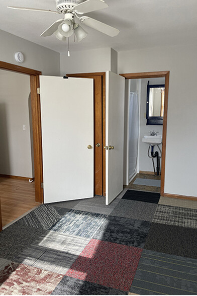 Bedroom facing bath, left door leads to kitchen - 245 N Seminary St