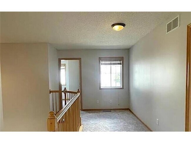 Building Photo - 6597 Olive Ln N