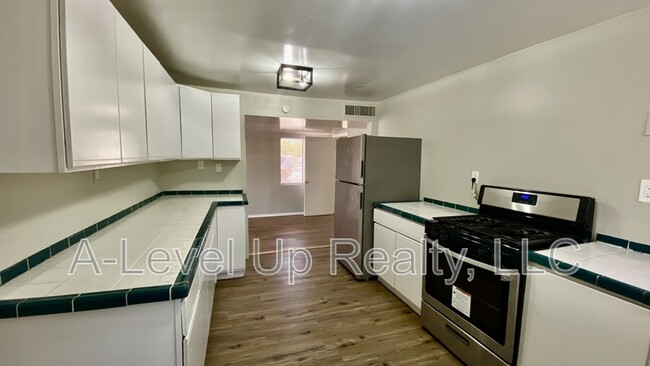 Building Photo - 3909 S 14th Ave