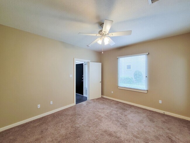 Building Photo - Elegant Gated Townhome Offering Unparallel...