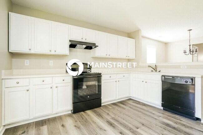 Building Photo - 4 Bedroom Pet-Friendly Home in Knightdale, NC with Main Street Renewal