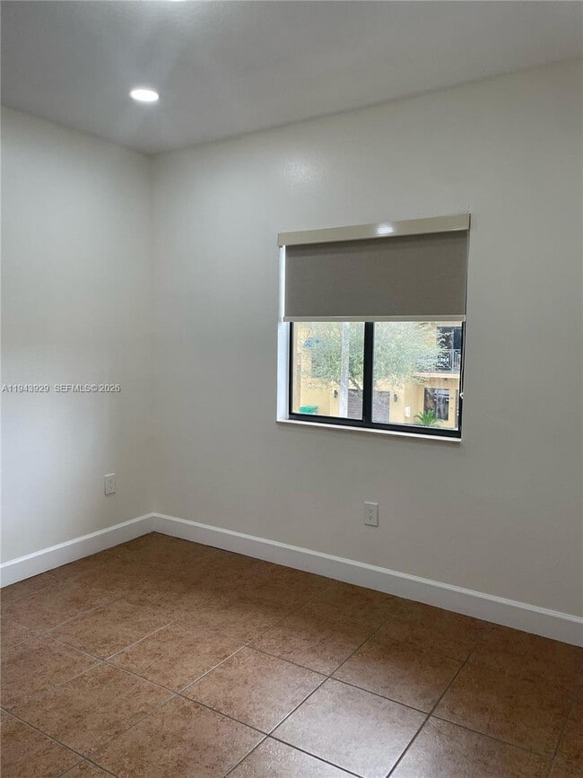 Building Photo - 11115 W Okeechobee Rd