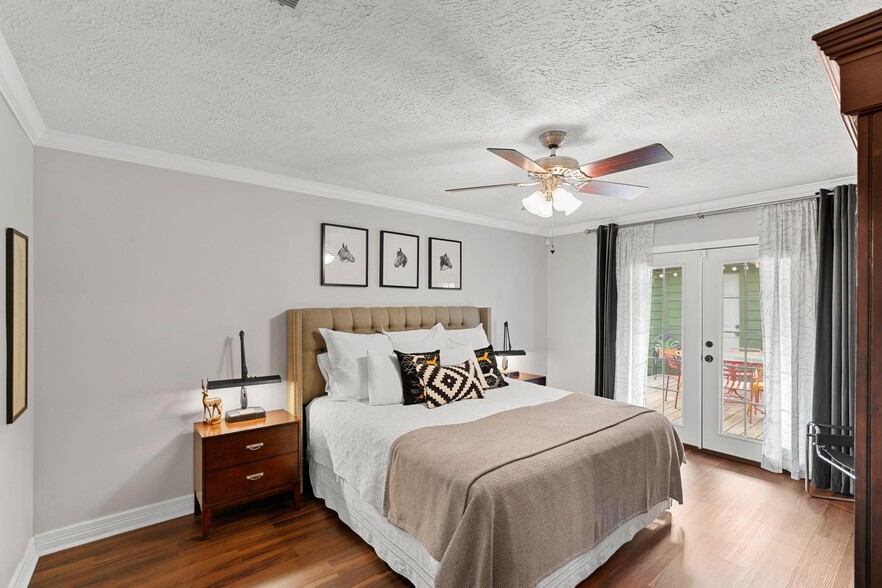 Modern master bedroom w/ en suite bath, walk-in closet and French doors - 1178 Bournewood Dr