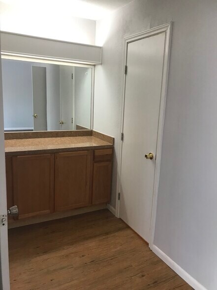 Vanity area in primary bedroom - 1338 Churing Dr