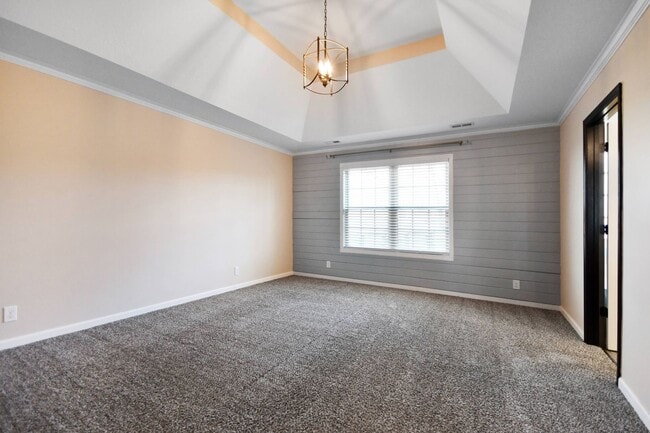 Building Photo - Pet Friendly Three Bedroom with Bonus!