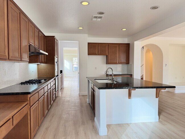 Building Photo - Spacious 6-Bedroom Estate in the Heart of Eastvale