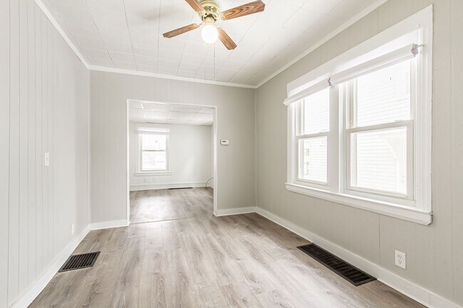 Building Photo - Spacious Rochester 3-Bedroom Home with Enclosed Porch + Backyard