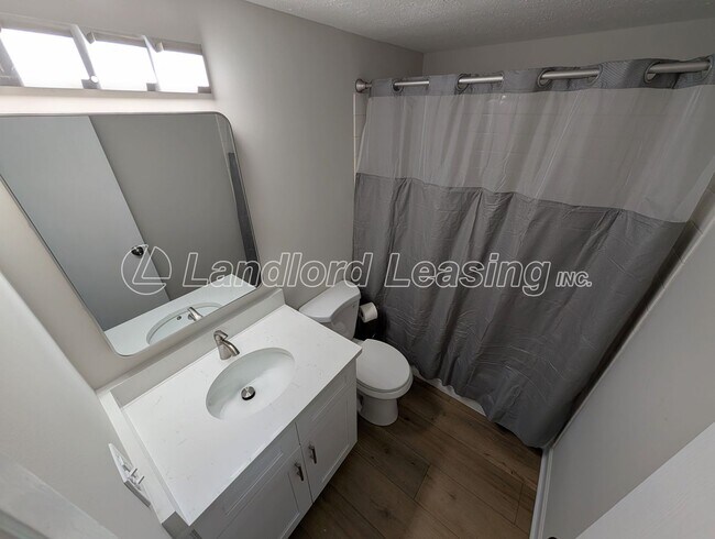 Building Photo - Reduced Price on this Updated 2-Bedroom Condo Steps from Crocker Park – Pool & Clubhouse