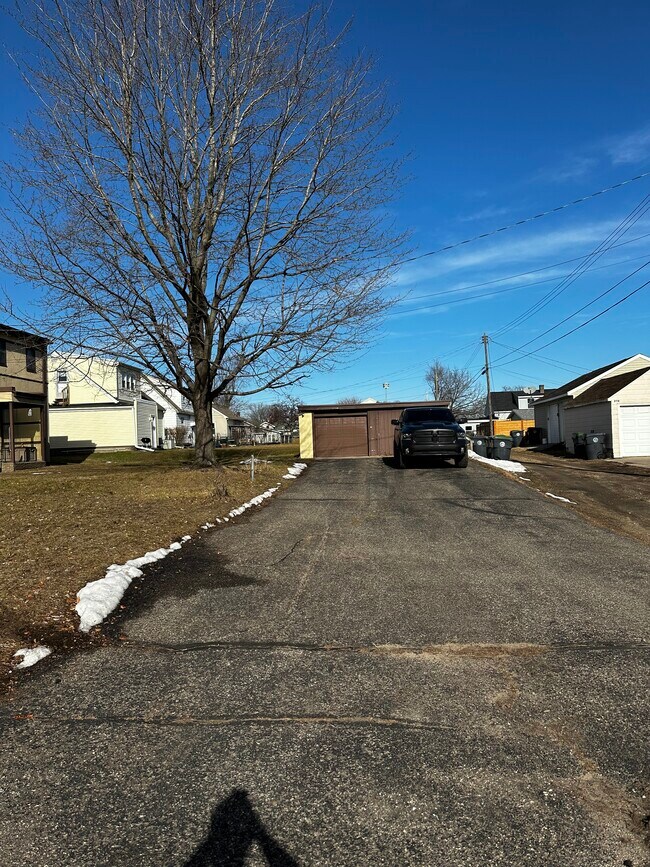 Off street parking with garage stall on the right - 2119 14th St S