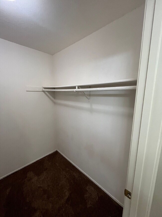 Building Photo - Downstairs 2 bedroom unit with parking and a patio