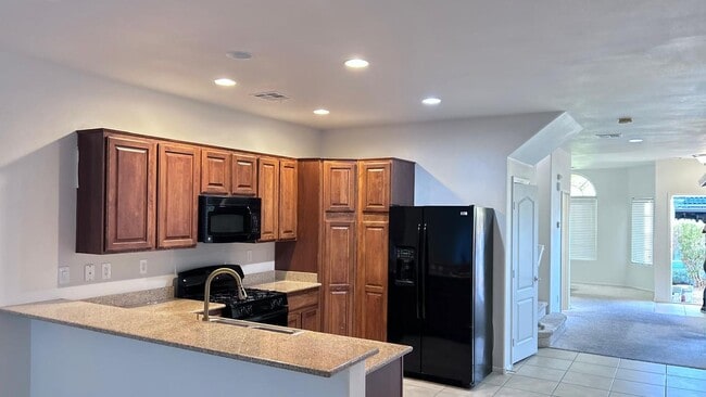 Building Photo - Freshly Painted 3 Bedrooms Home in Gated M...