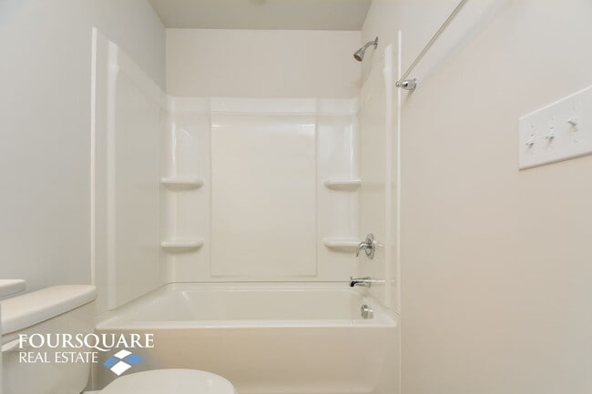 Building Photo - Modern 3-Story Townhome with First-Level B...