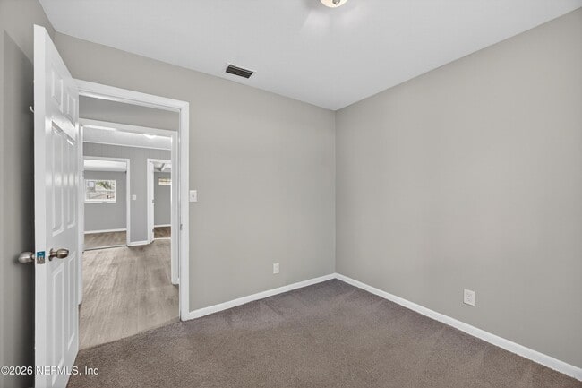 Building Photo - 6955 Miss Muffet Ln S