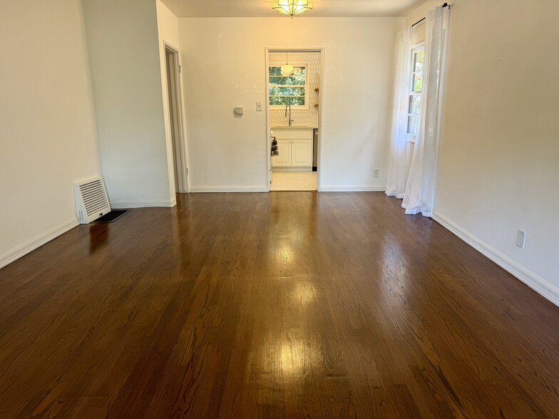 Living room/Dining area looking into kitchen - 2101 Laverna Ave