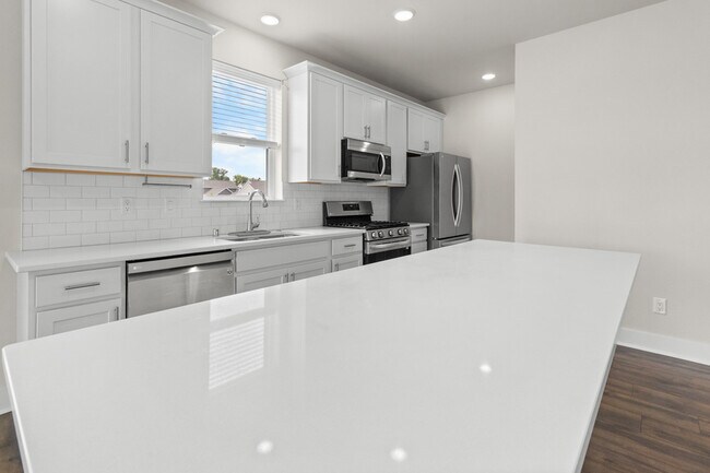Building Photo - W218N16046 Tiger Lily Dr
