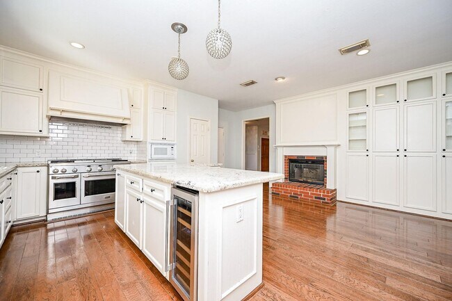 Building Photo - Discover this stunning one-story corner lo...