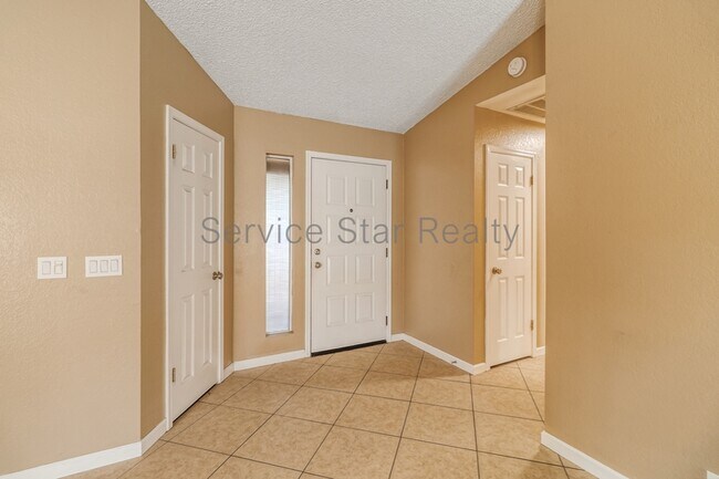 Building Photo - 10415 N 63rd Dr